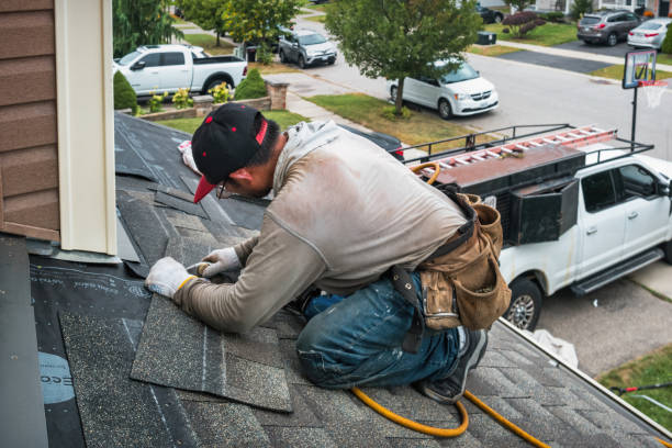 Professional Roofing technician working in New Ringgold, PA